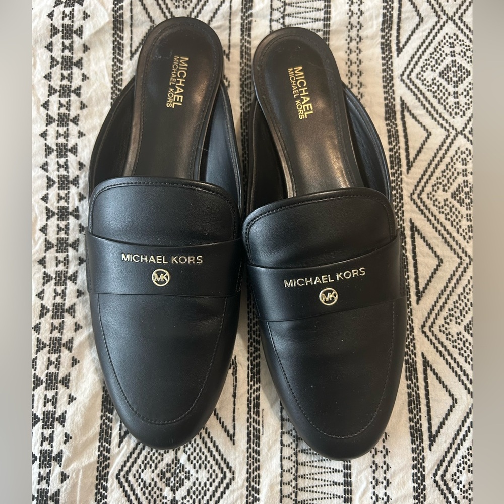 Michael Kor’s Black leather mule slide shoe, women’s size 8.